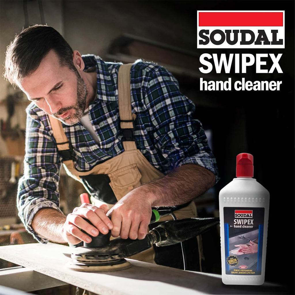 Tradesman in a workshop using Soudal Swipex hand cleaner to remove grease and timber dust