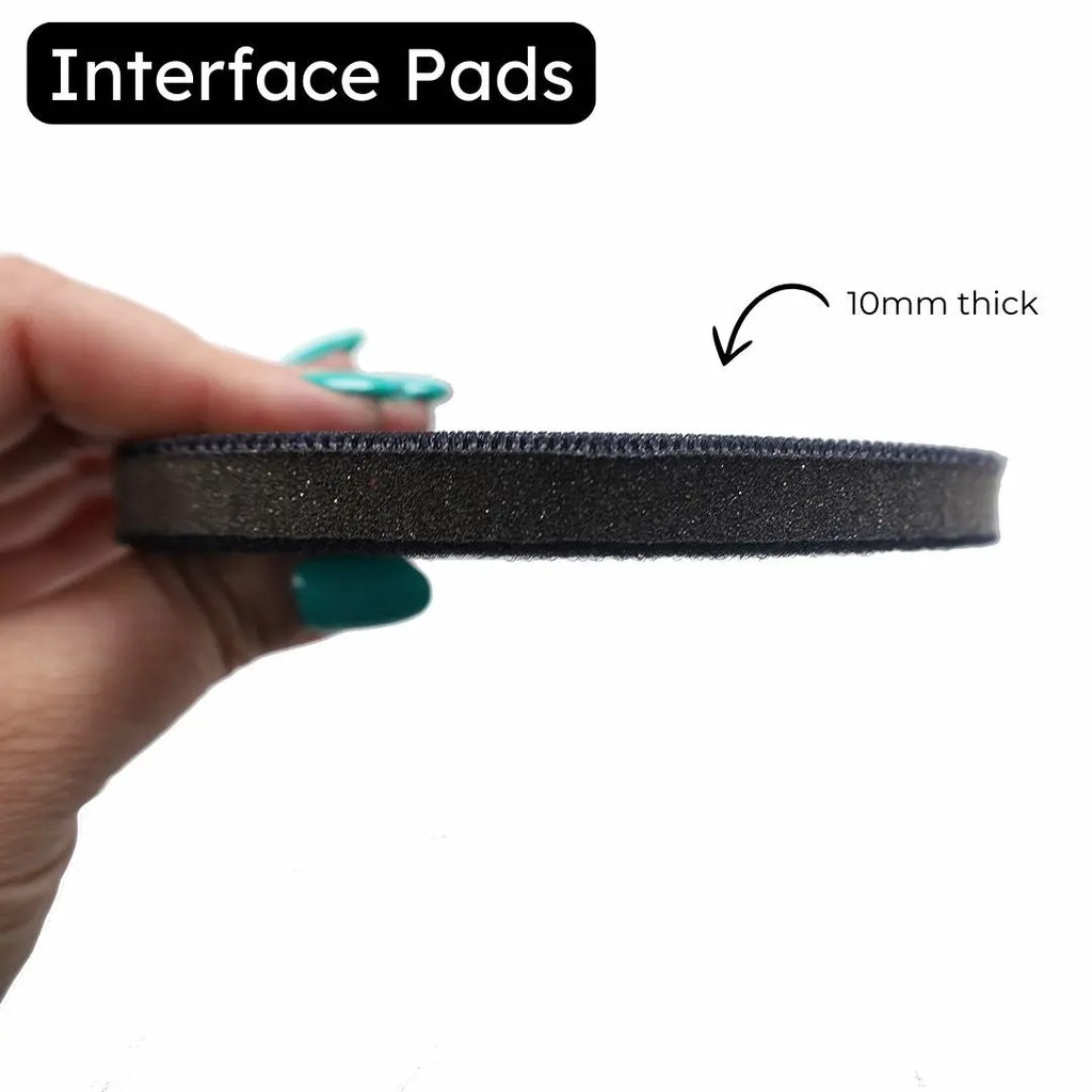 Hand holding a 10mm thick flexible interface pad to show its soft foam profile
