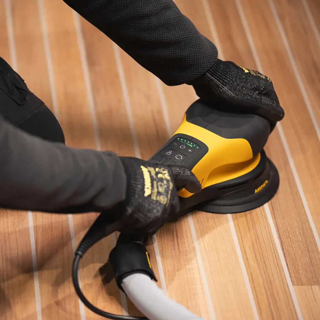 Sanding a timber boat deck with the Mirka DEROS RS 600 to achieve a smooth marine finish