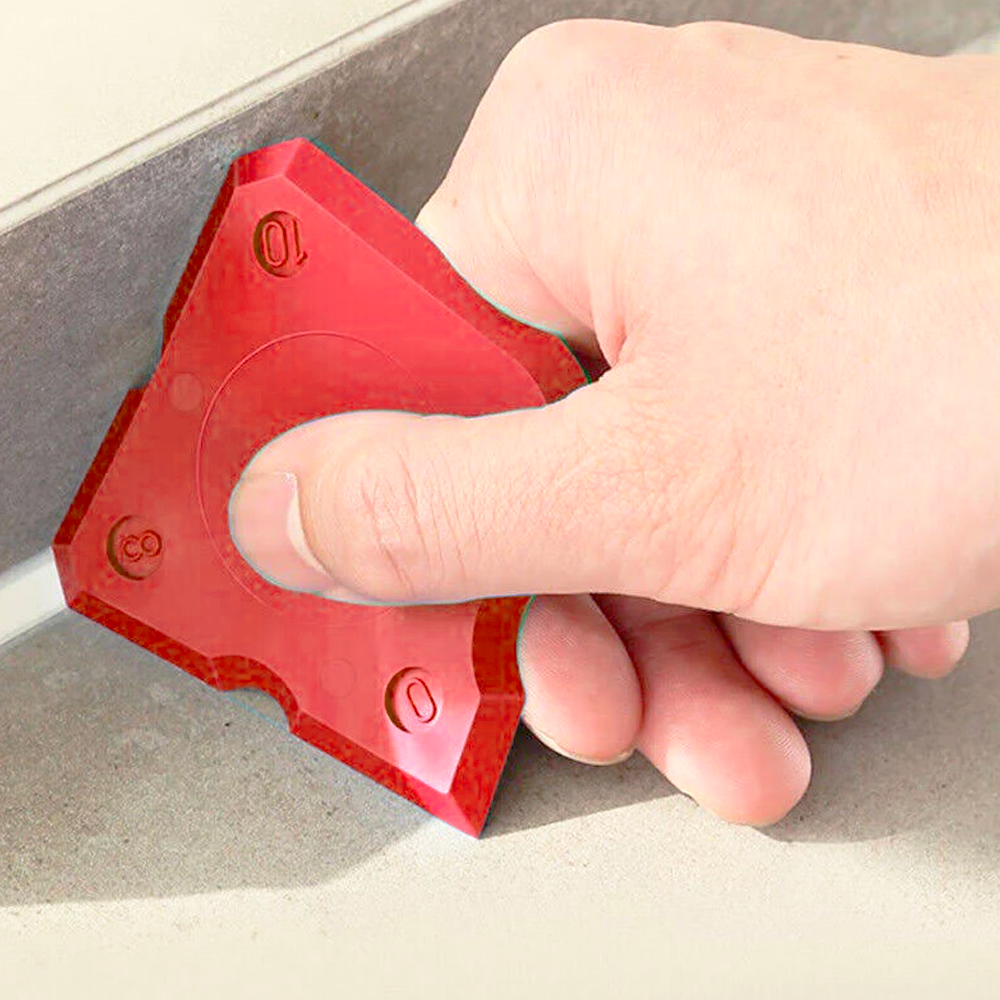 Using a Soudal red silicone spatula to create a perfect 45-degree corner joint